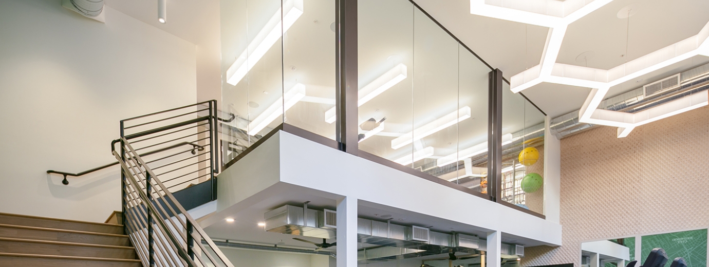 Fitness center with workout machines and yoga room